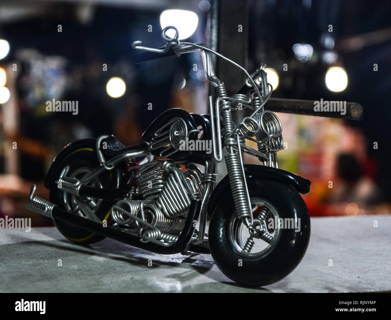 Spring Cable Motorcycle Motorcycle assembled from springs and wire. Motorcycle assembled from ...