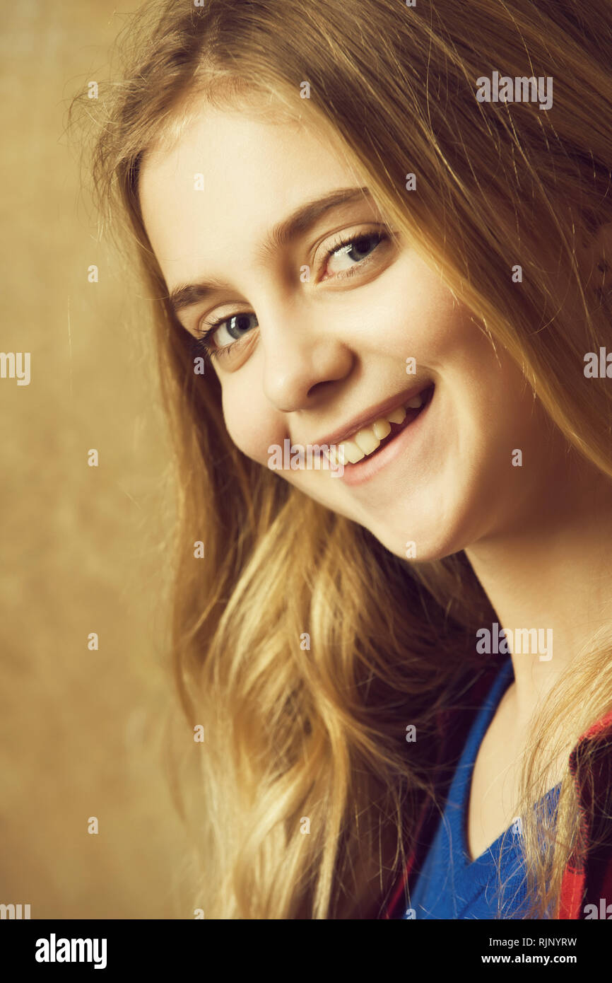 beautiful happy smiling girl with blond hair Stock Photo - Alamy