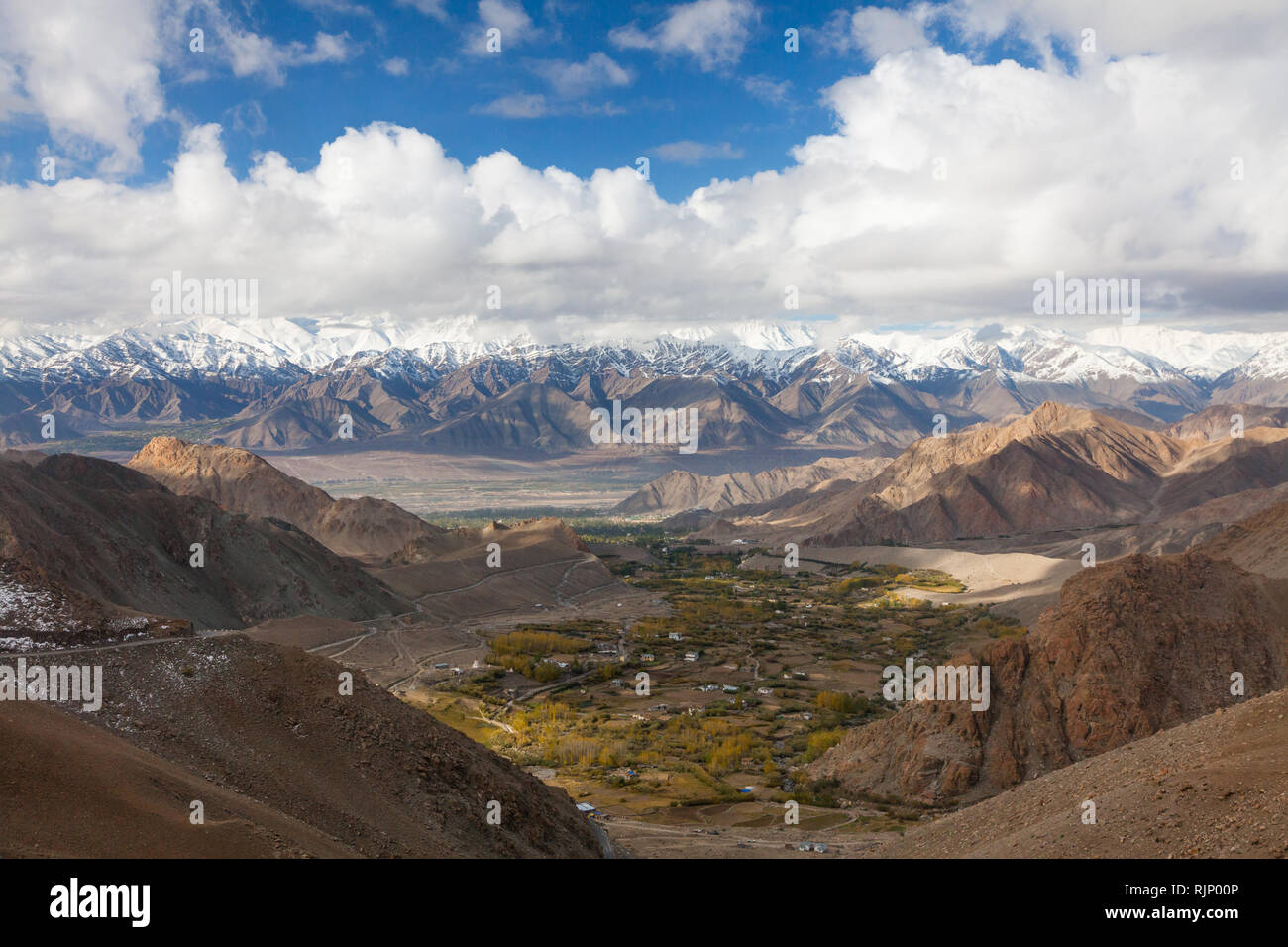 View towards Leh, Indus Valley and Stok Range from from the high altitude road connecting Leh and Khardung La, Ladakh, Jammu and Kashmir, India Stock Photo