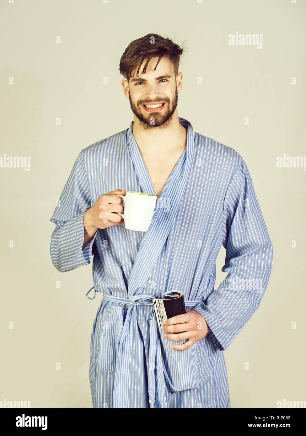 Caucasian man in robe drinking hi-res stock photography and images - Alamy