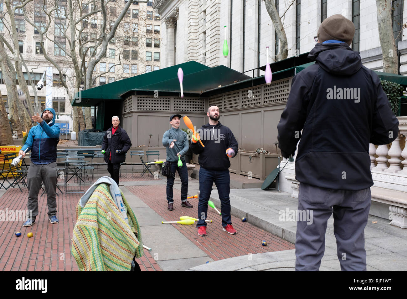 People practice juggling skills in Bryant Park.Midtown Manhattan.New
