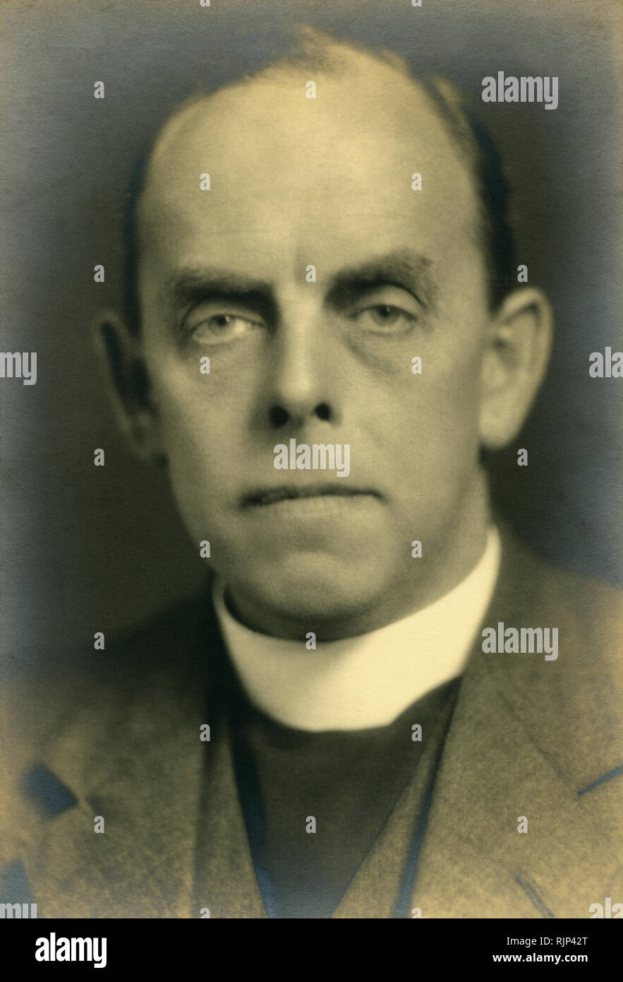 Formal portrait of vicar, 1930s Stock Photo