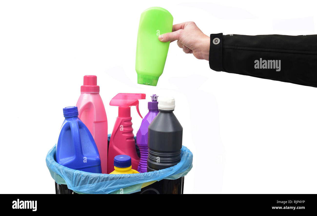 hand put a plastic bottle in a recycling bin Stock Photo Alamy