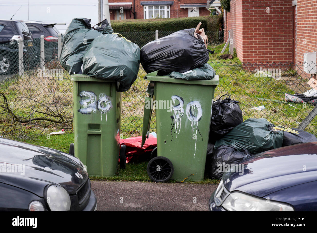 Post Christmas rubbish awaiting collection, outside homes on Lipson Road, Cheltenham.     Picture by Thousand Word Media.  NO SALES, NO SYNDICATION. C Stock Photo