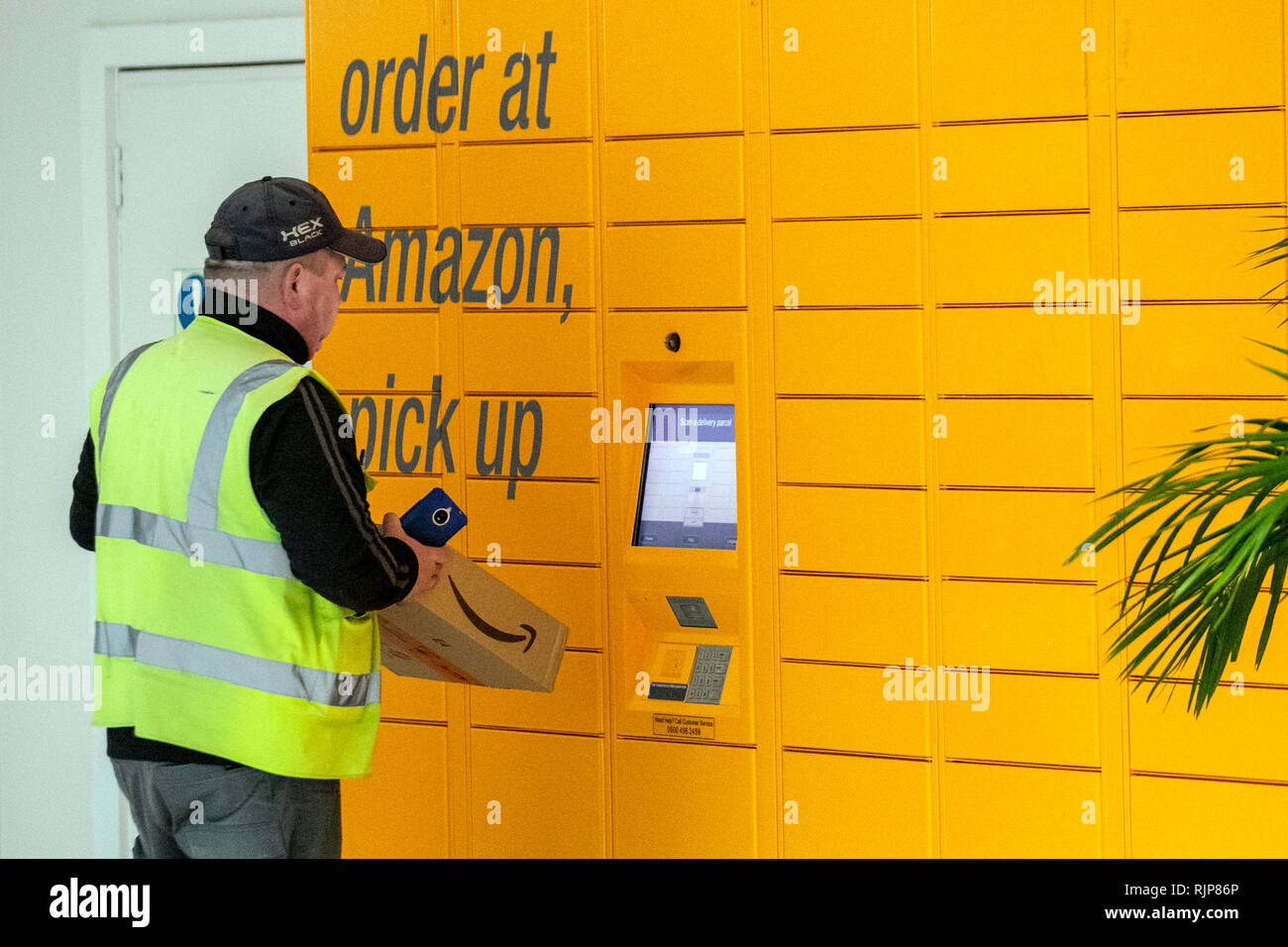 Order Pick Up point package Locker for Amazon delivery parcels, UK Stock Photo