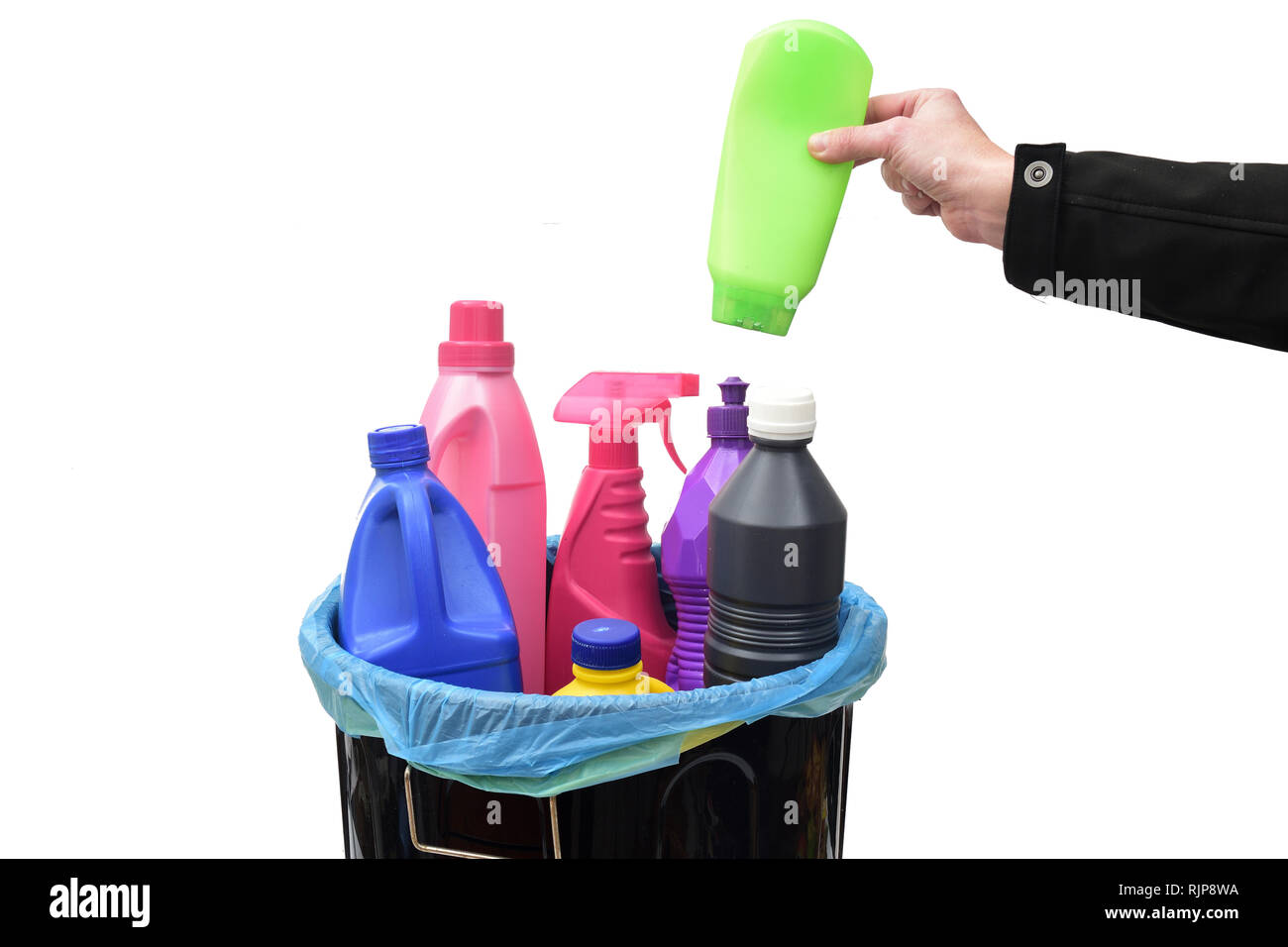 hand put a plastic bottle in a recycling bin Stock Photo Alamy