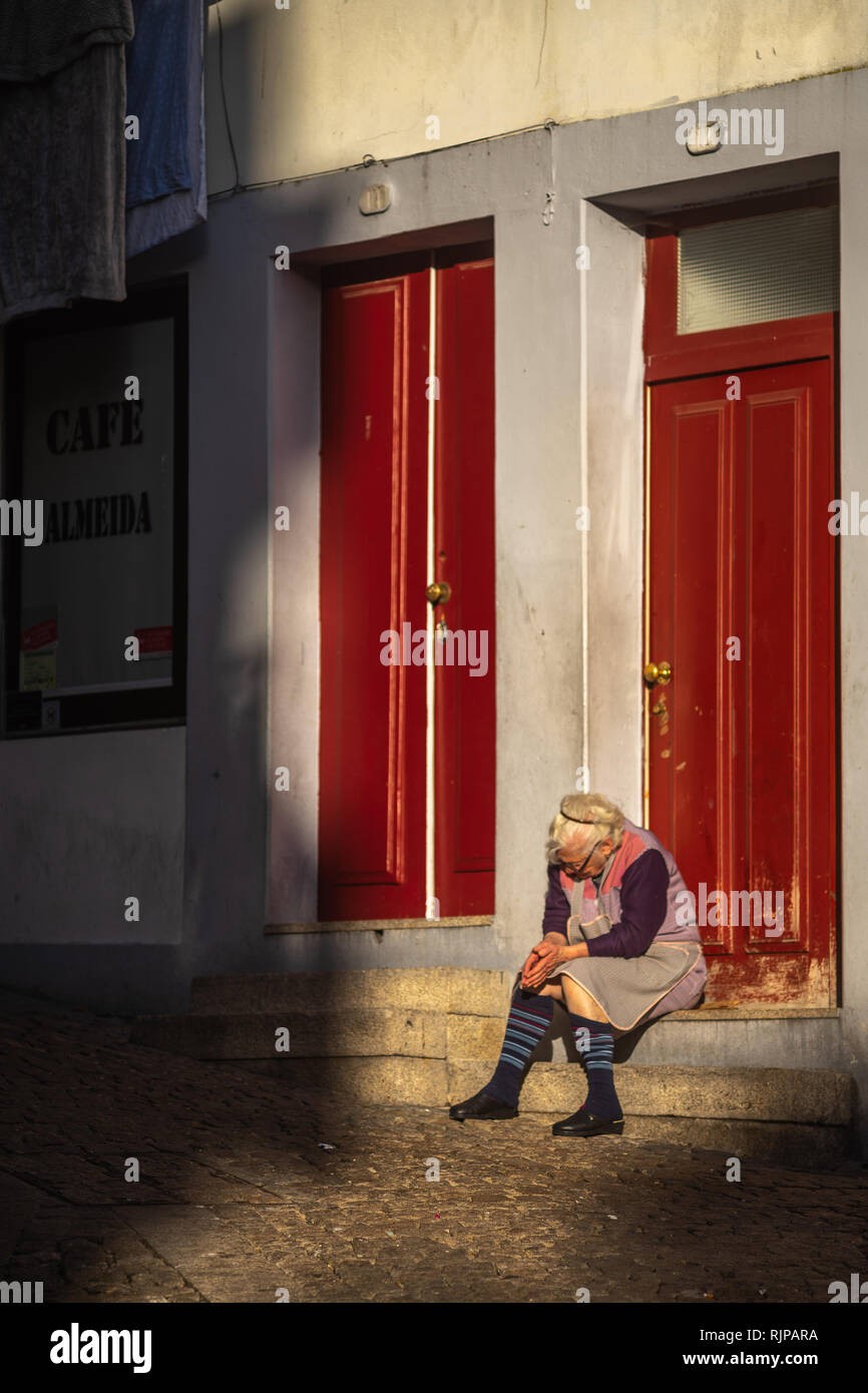 old woman grandmother sitting near his house Stock Photo - Alamy