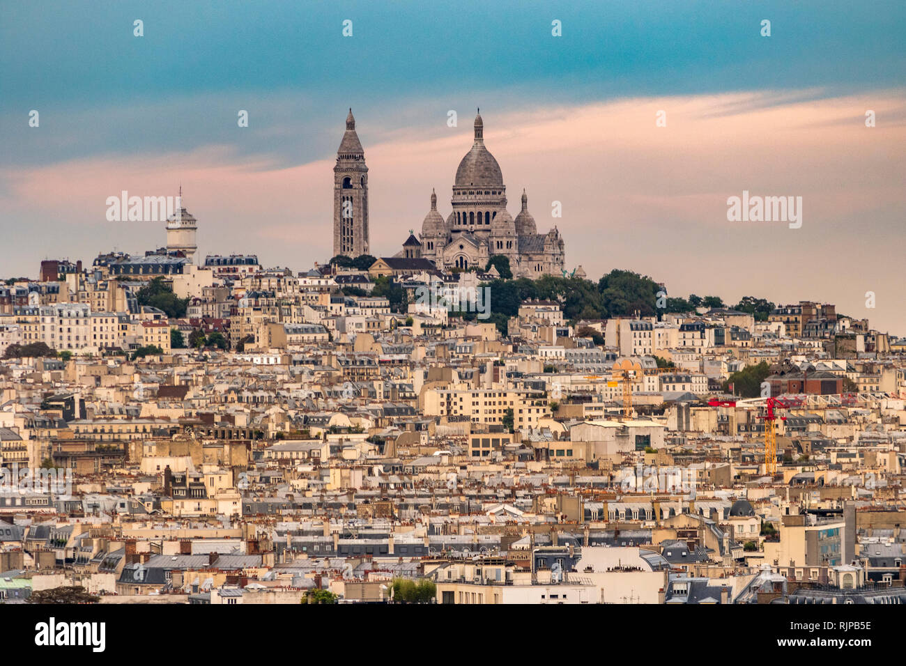 The Sacre-Cœur and Montmartre at sunset from the rooftop of the Arc de Triomphe ,Paris ,France Stock Photo