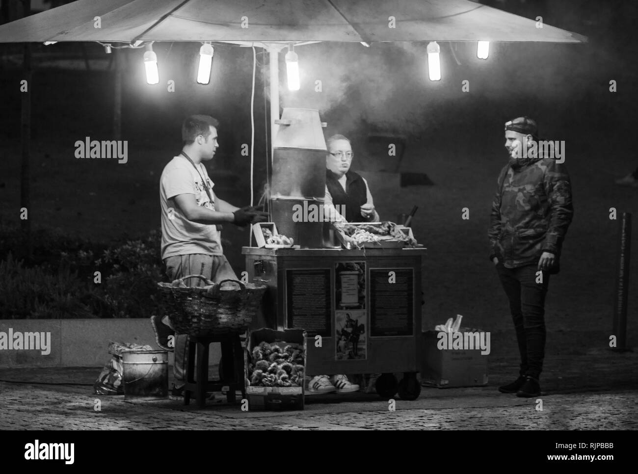 chestnut merchant in the city of porto in portugal black and white Stock Photo