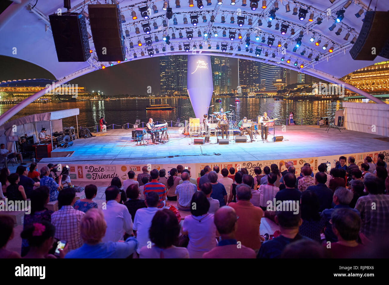 SINGAPORE - NOVEMBER 08, 2015: concert at night. Singapore, officially the Republic of Singapore, and often referred to as the Lion City, the Garden C Stock Photo