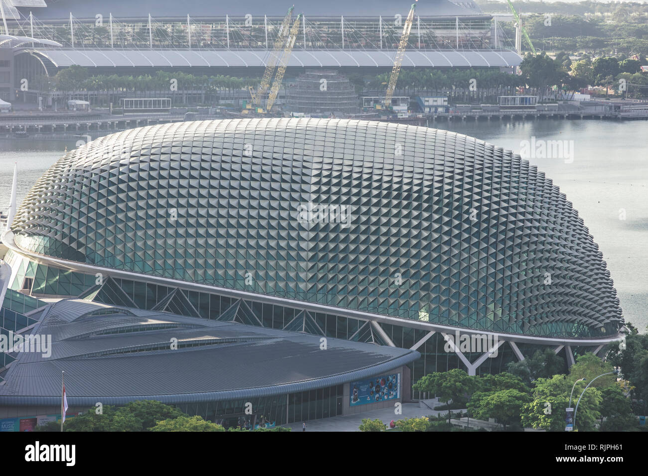 Singapore Marina Bay Sands Hotel and Esplanade theatres on the bay architectural close up details aerial view during clear sky day time Stock Photo