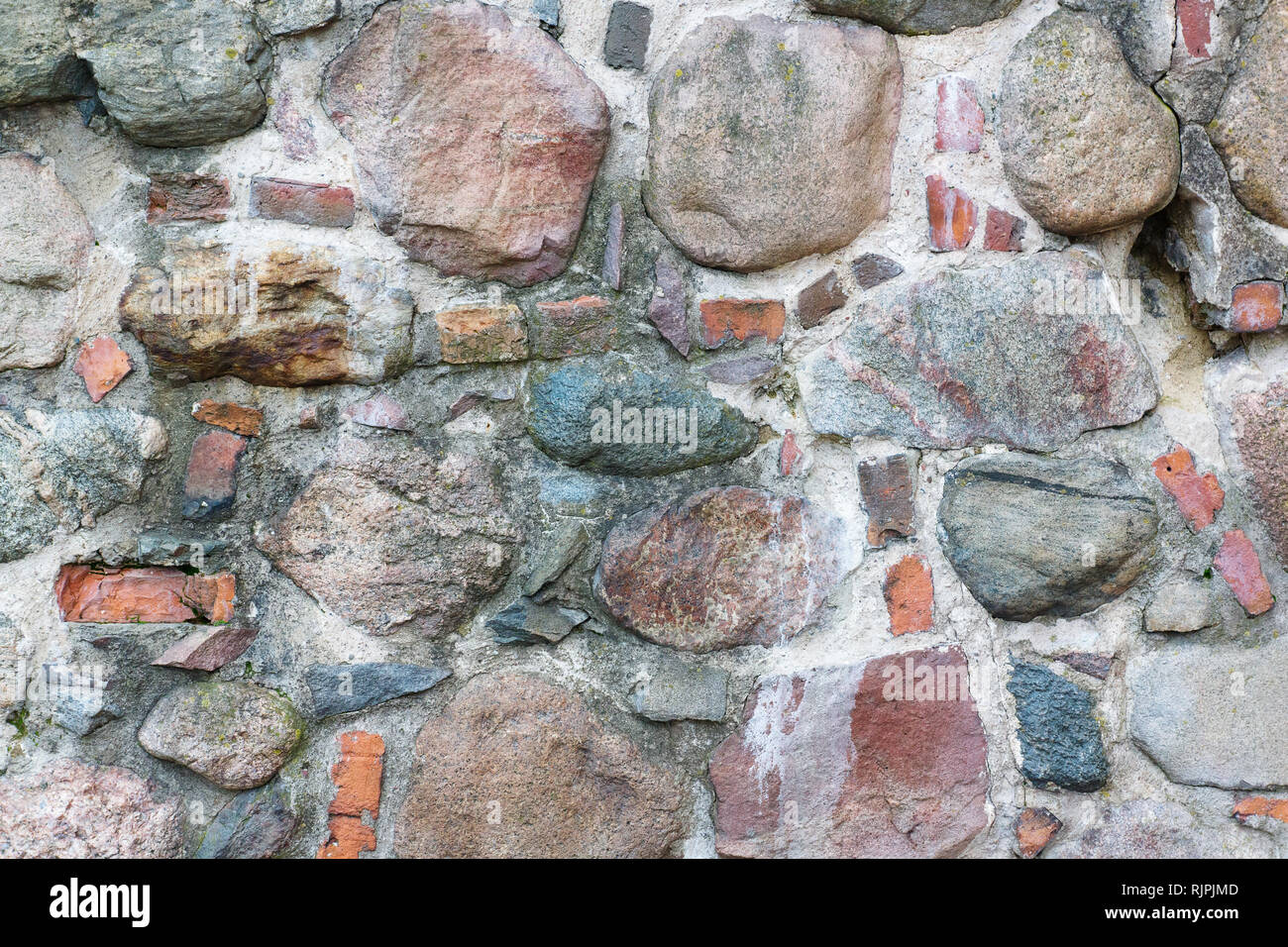 stones are arranged in a chaotic order and are a texture Stock Photo