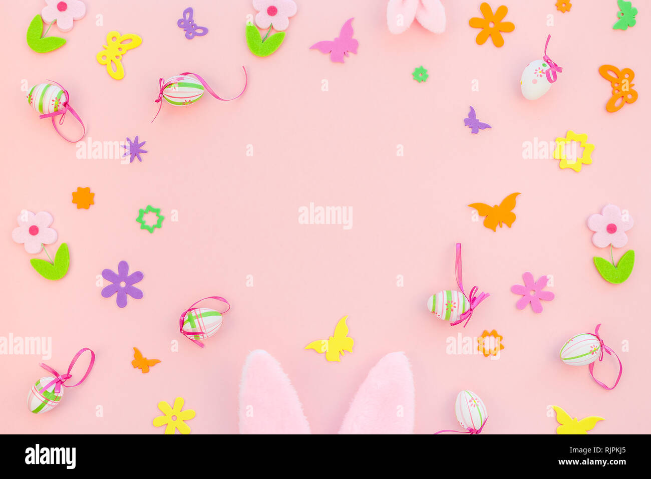Creative Top view flat lay holiday composition Easter eggs bunny ears ...