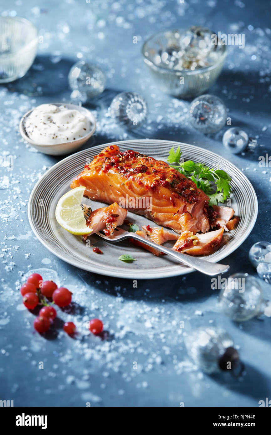 Roasted salmon fillet on plate, seasonal Christmas food Stock Photo