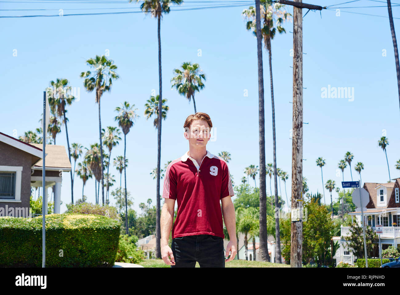 Young man in suburbs, Los Angeles, California, USA Stock Photo