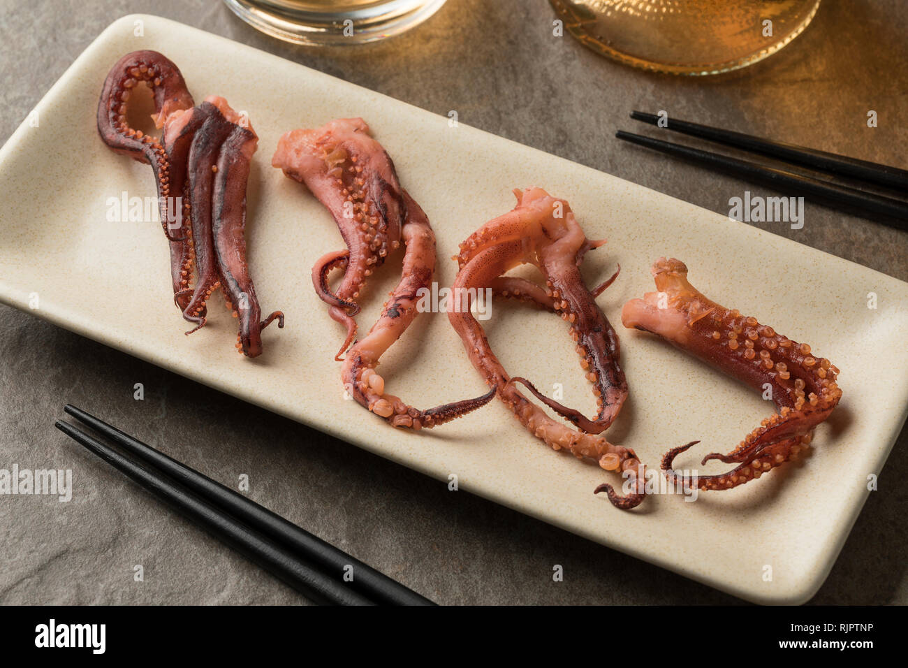 Dish with Japanese dried squid tenctacles with vinegar flavor as a