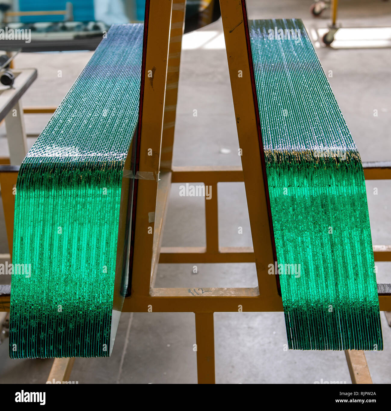 Tempered bus glass products in tempered glass factory. Tempering industry  Stock Photo - Alamy