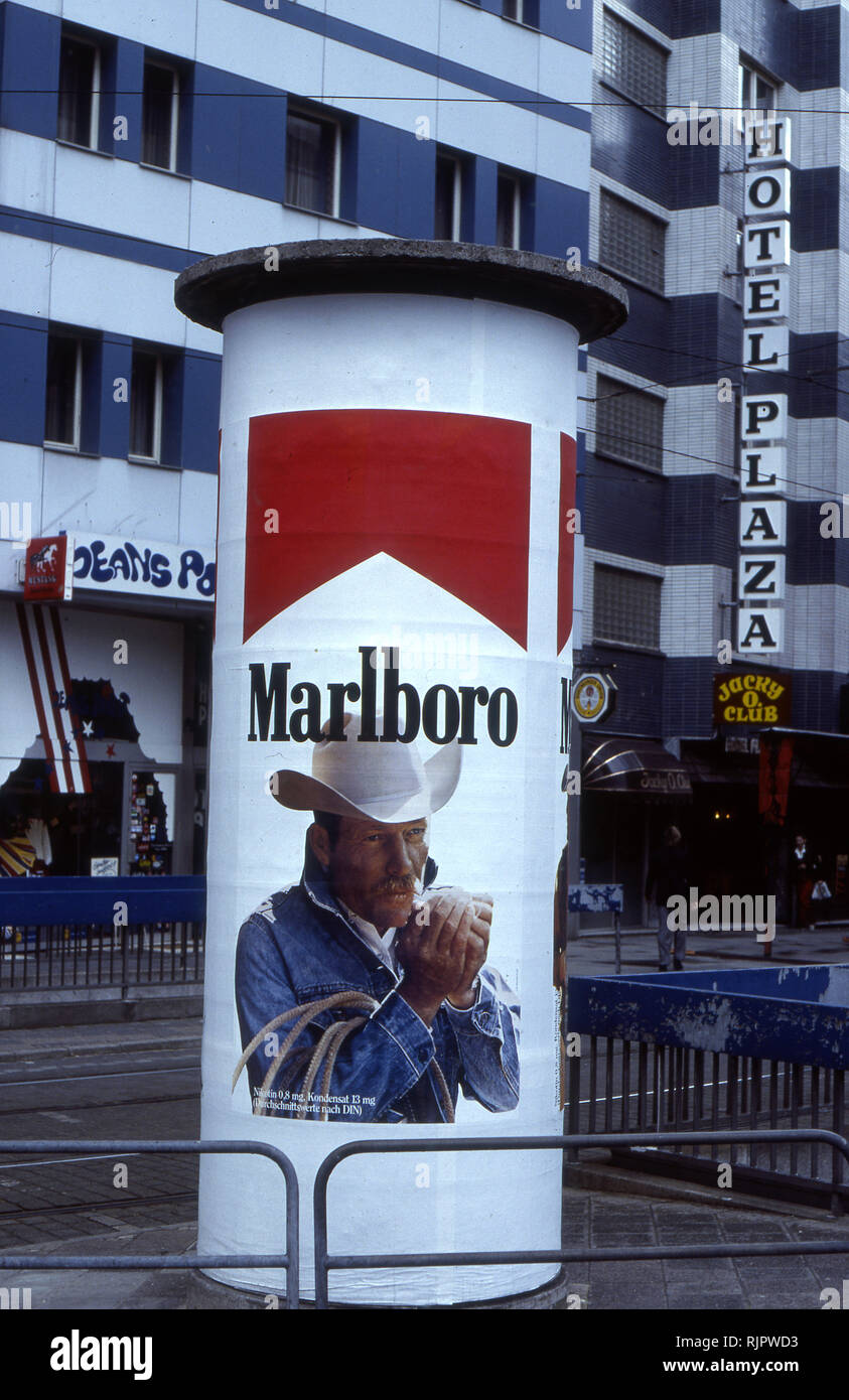 European advertising kiosk featuring ad for Marlboro cigarettes in Frankfurt, Germany Stock Photo