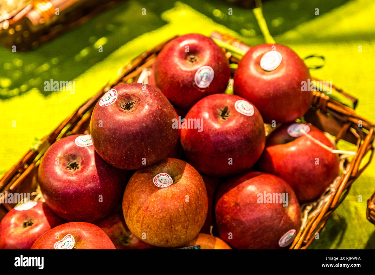 BOLOGNA, ITALY - DECEMBER 16, 2018: lights are enlightening MELANURCA CAMPANA IGP apples at FICO Eataly World, the largest gourmet agri-food park in t Stock Photo