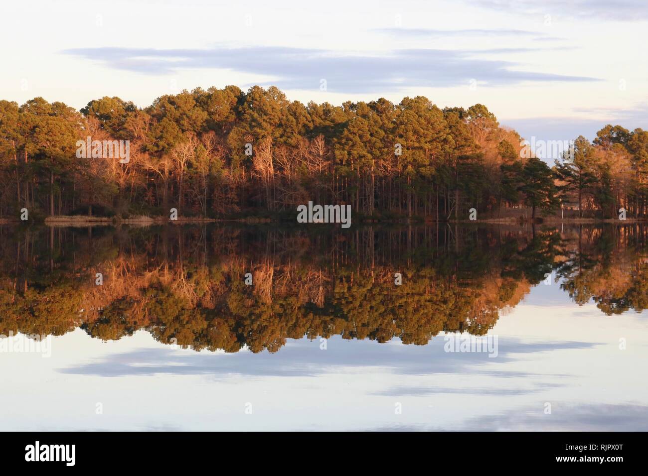 Sunset sky reflecting in water hi-res stock photography and images - Alamy