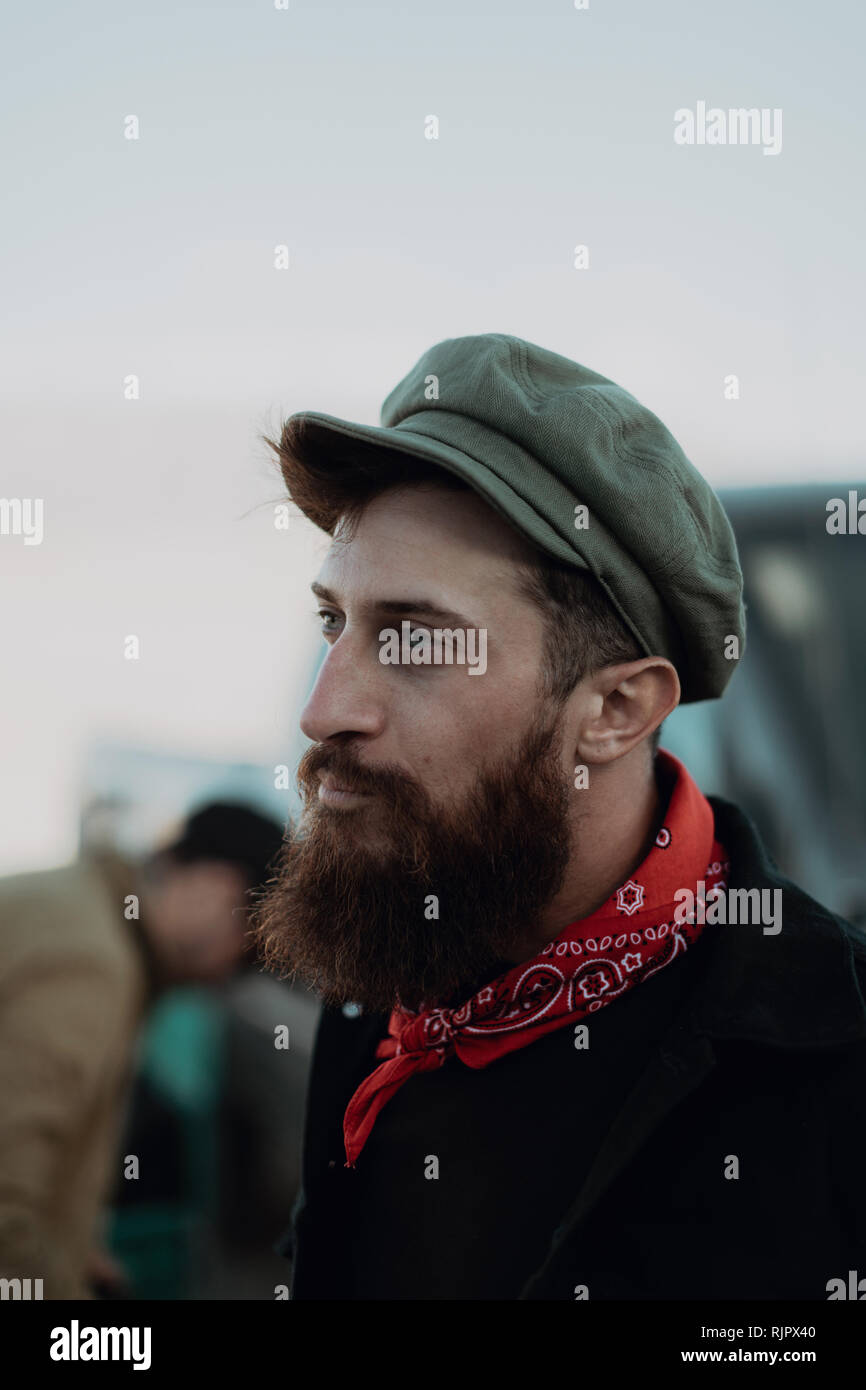 Bearded man in cap and neckerchief Stock Photo - Alamy