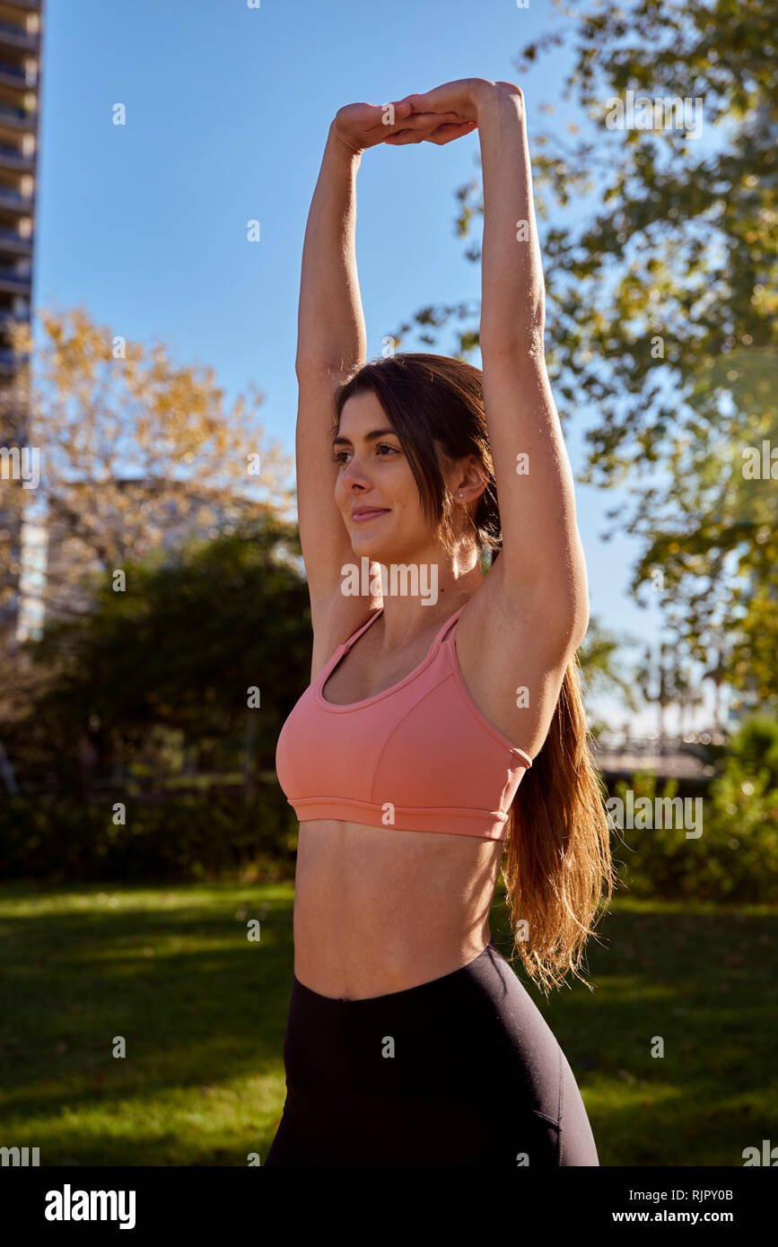 Woman stretching city in hi-res stock photography and images - Alamy