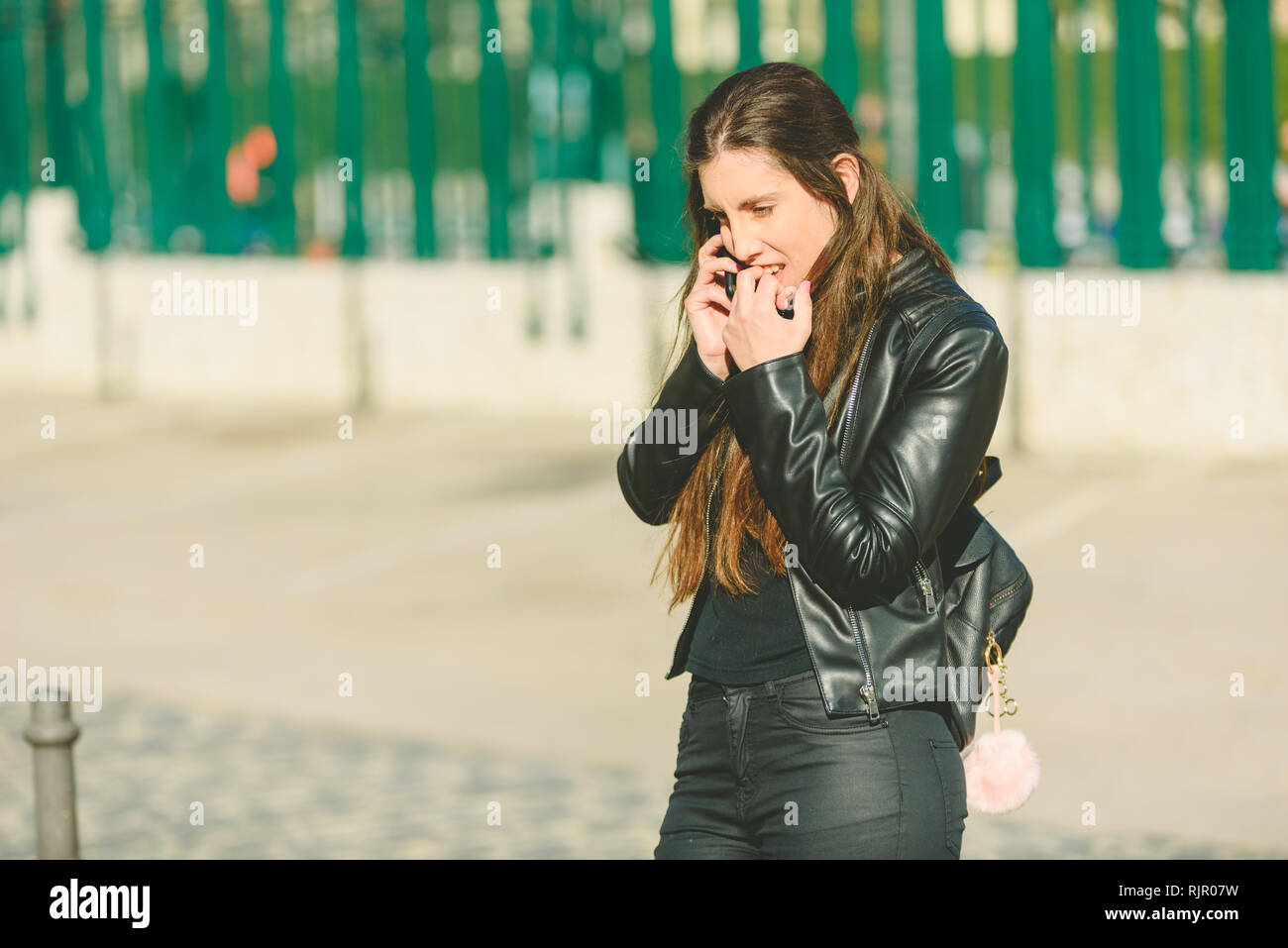 Sad girl feeling upset receiving bad news in mobile message on ...