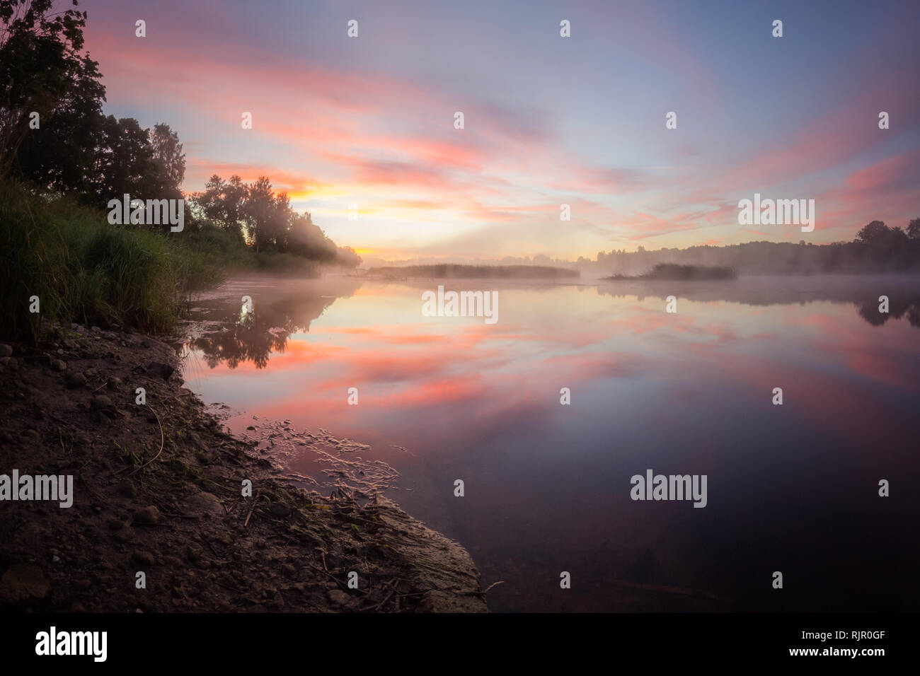 Foggy sunrise over the river, golden hour sky, fog above river ...