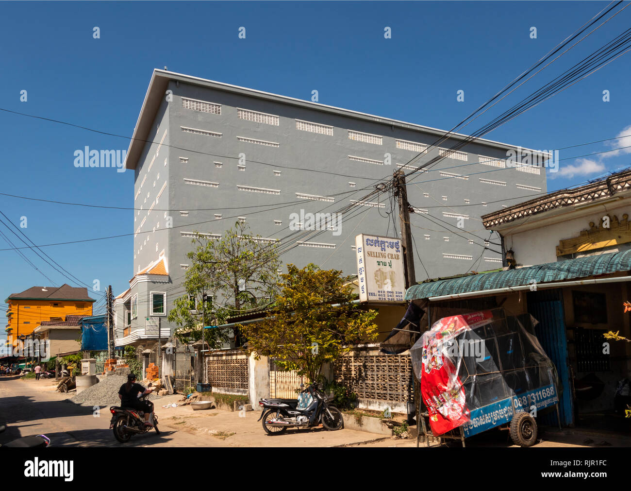 Cambodia, Preah Koh Kong, town centre, tall three storey extension above home to house birds nest soup swiftlets Stock Photo