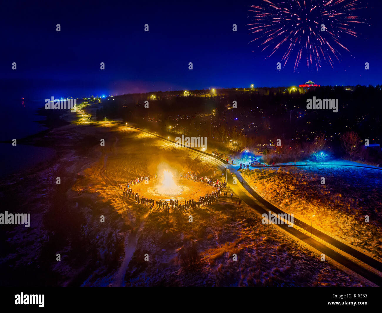 New Year's Eve Celebrations with bonfires and fireworks, Reykjavik, Iceland Stock Photo