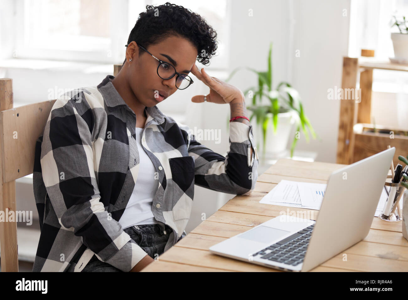 Bored african american woman tired from computer work or study Stock Photo  - Alamy