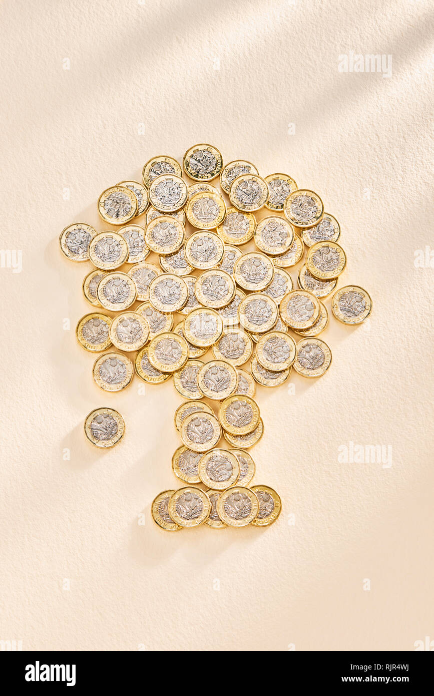 Collection of £ One Pound Coins in the Shape of a Tree Stock Photo