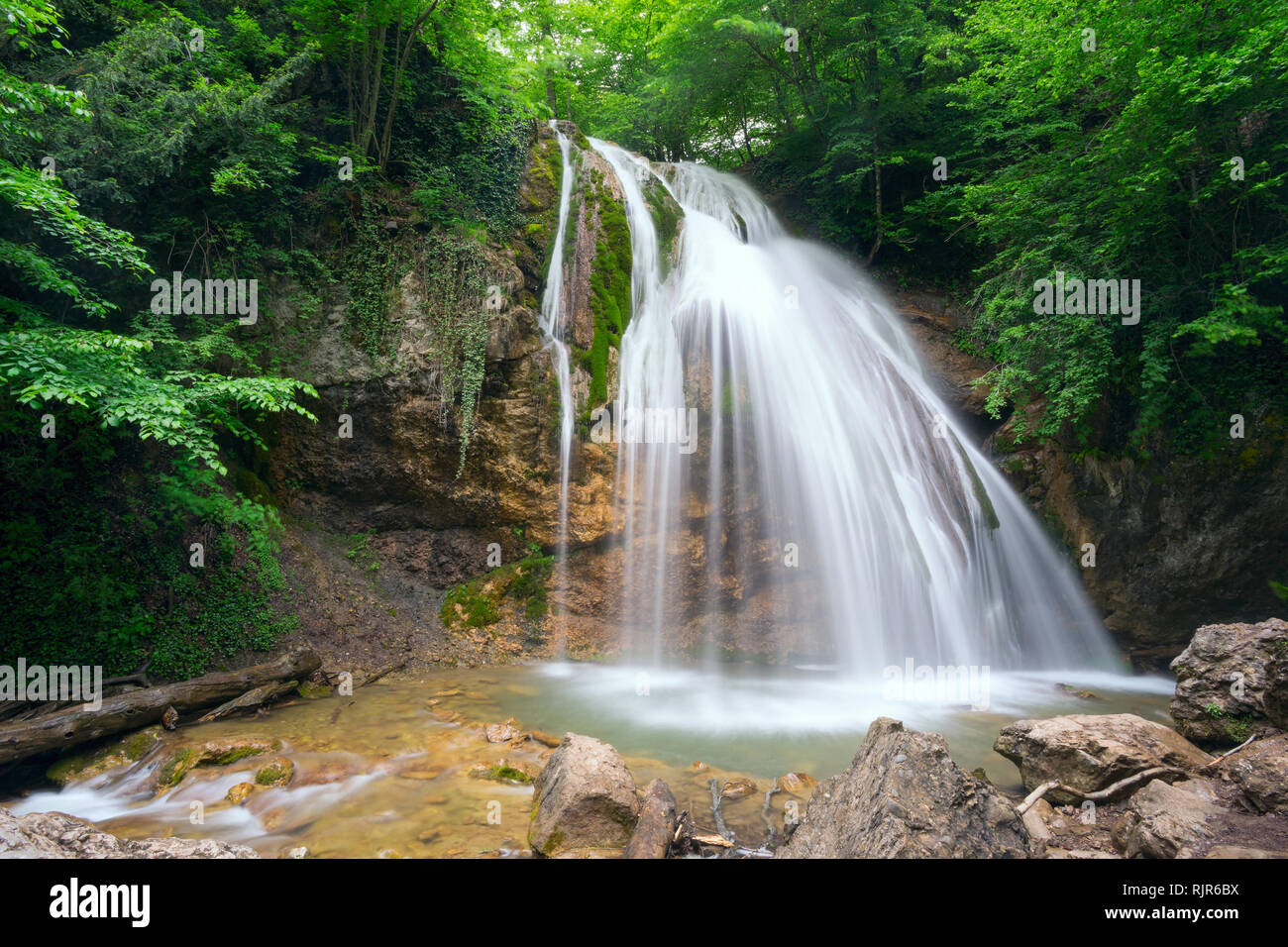 Dzhur- waterfall on the river Ulu-Uzen . Stock Photo