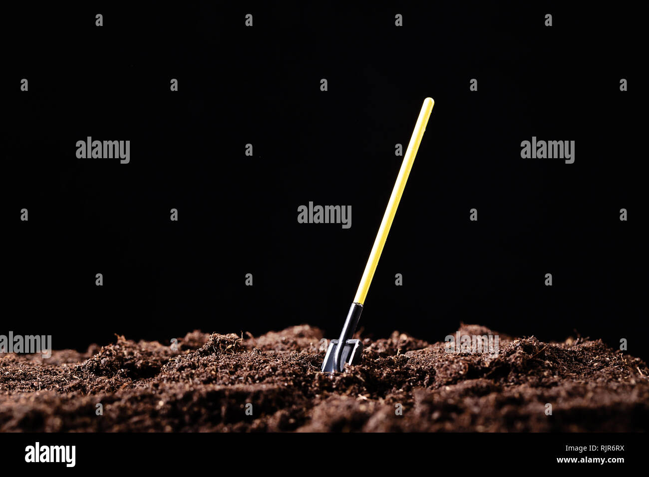 Shovel stuck in pile hi-res stock photography and images - Alamy