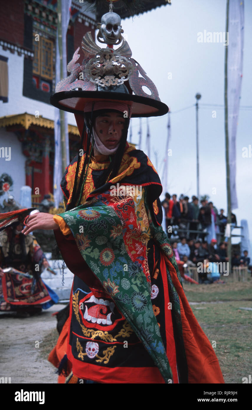Caption: Pemagantse, Sikkim, India - Feb 2003. A black-hat dancer at the  annual Bumchu Masked Dance Festival in Sikkim. Held immediately before the  Ti Stock Photo - Alamy
