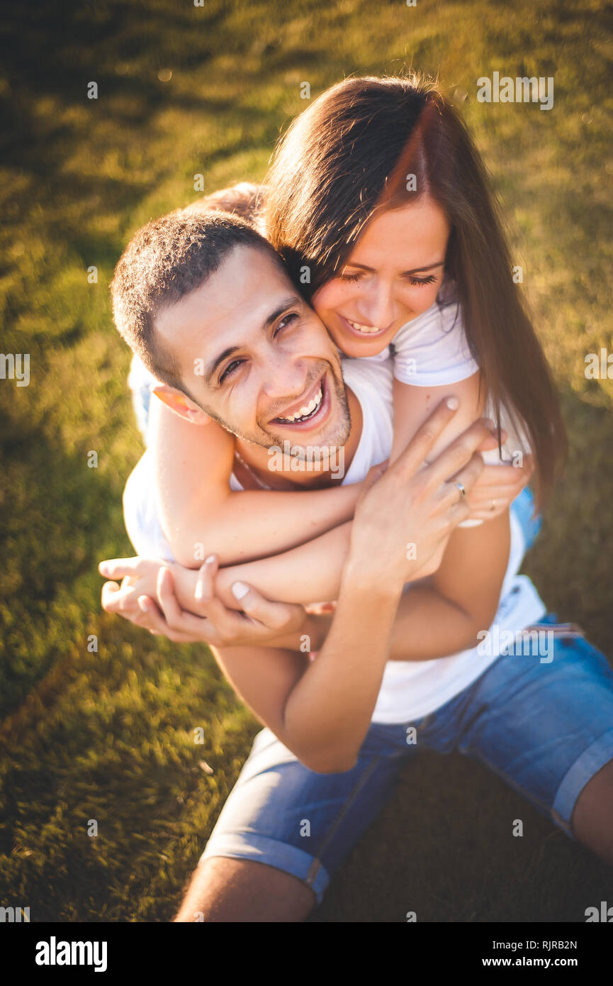 Young couple in love in the summer park Stock Photo - Alamy