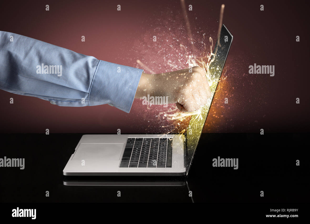 Strong arm boxing laptop screen strongly Stock Photo - Alamy