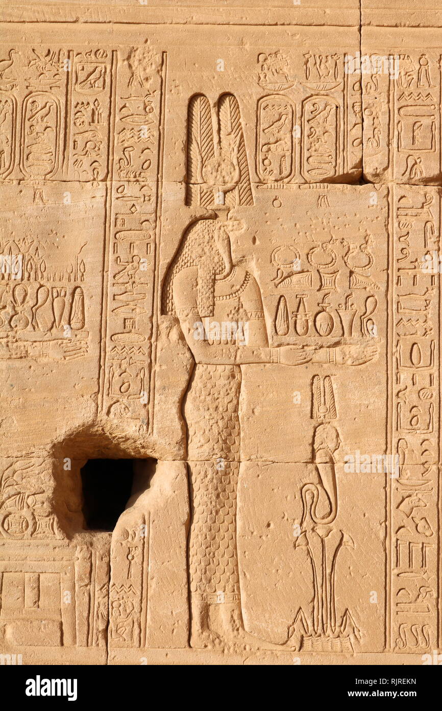 Egyptian Goddess makes an offering. From a relief at the Temple of Hathor, Dendera Egypt Stock Photo