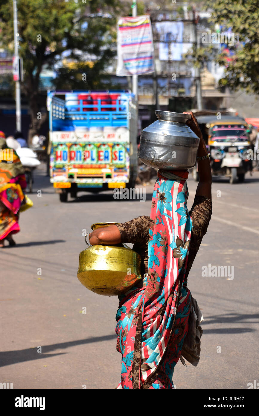 Water carrier, sari, Bundi, Rajasthan, India Stock Photo - Alamy