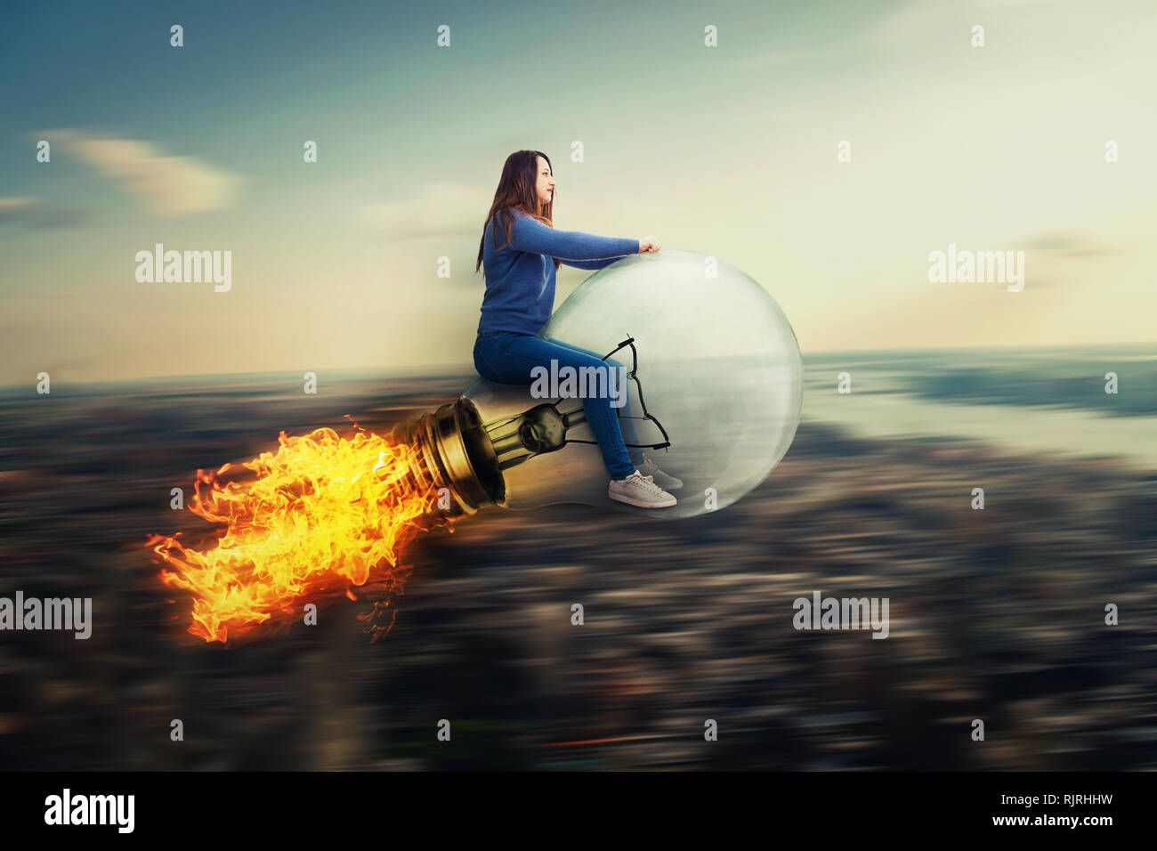 Surreal view as confident young woman driving a bulb rocket ship, flying over the city on the speed of light. Mystic lamp transportation time travel.  Stock Photo