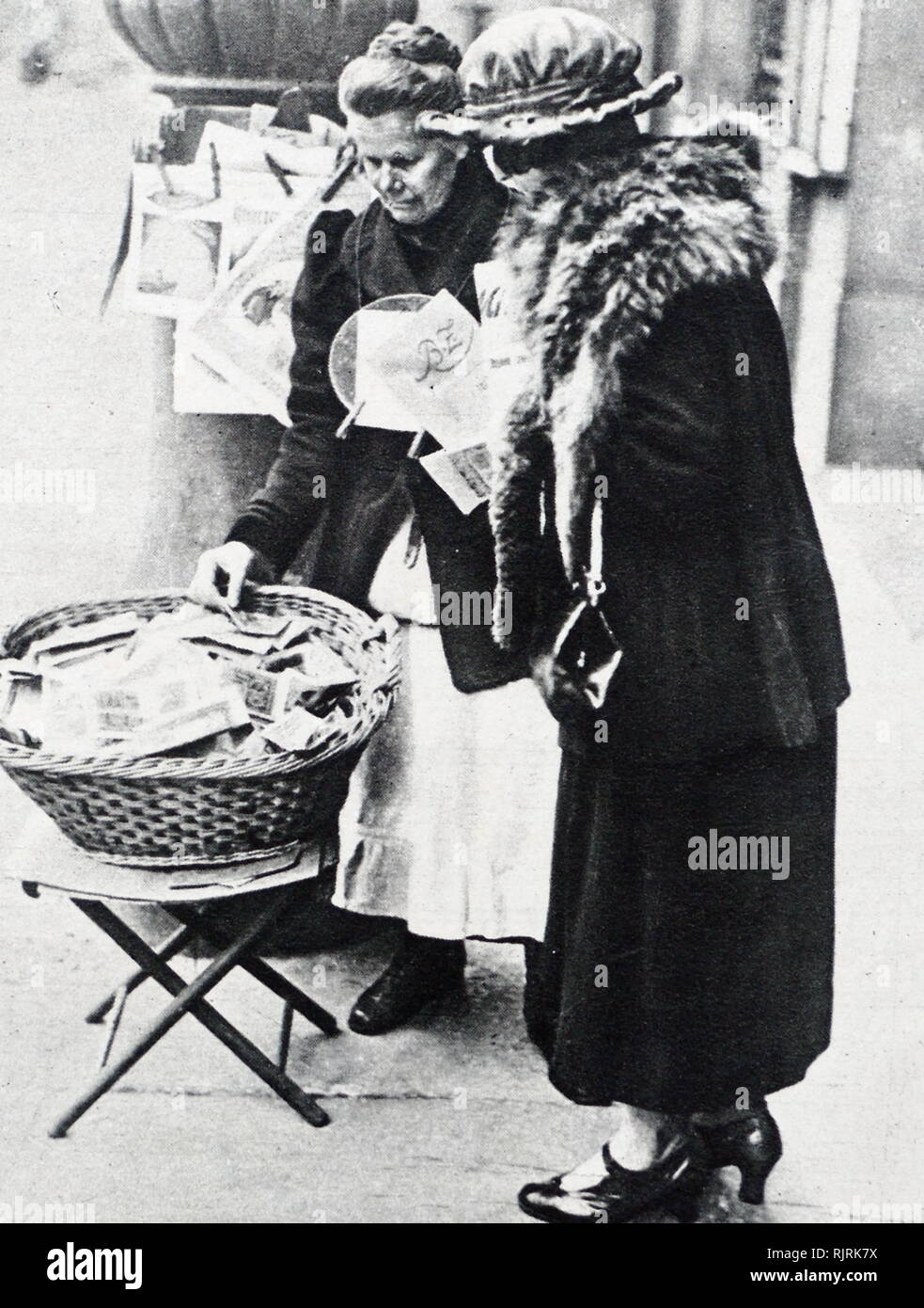 Basket full of banknotes during hyperinflation era in Weimar Germany 1923.  By November 1922, the value in gold of money in circulation had fallen from  £300 million before World War One, to £