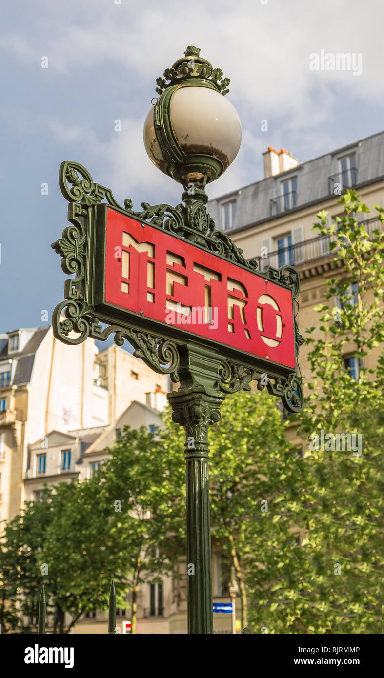 Decorative lantern and a pointer entry in the Paris metro. France Stock Photo