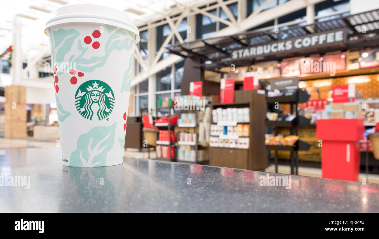 CHICAGO, IL - DECEMBER 1, 2018 - Starbucks shop inside O'Hare Travel Plaza with different coffe types on display Stock Photo