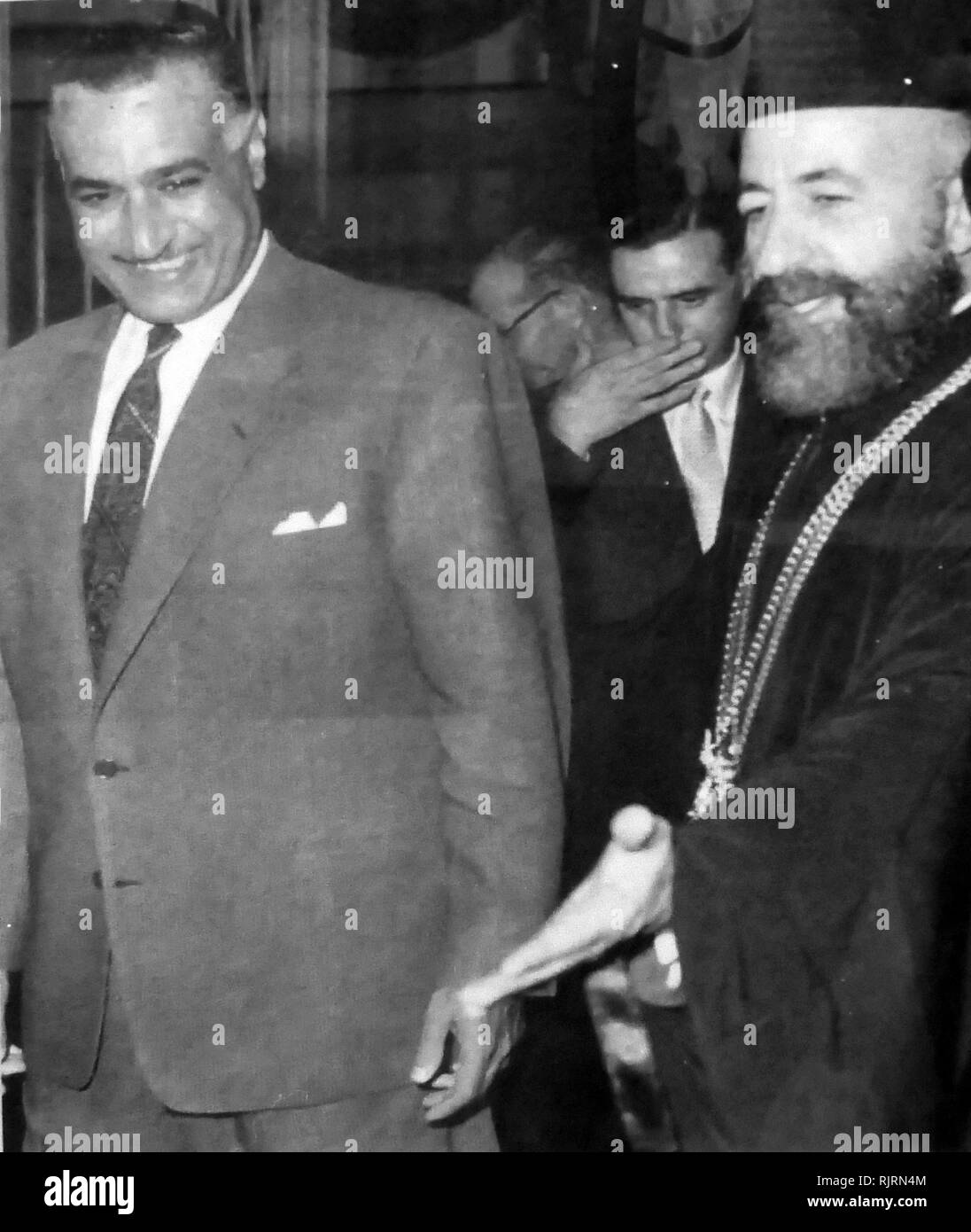 President Nasser meets with Greek Cypriot President, Archbishop Makarios in Cairo, 1961. Gamal Abdel Nasser (1918 - 1970), President of Egypt, from 1956 until his death in 1970. Nasser led the 1952 overthrow of the monarchy and introduced far-reaching land reforms the following year Stock Photo