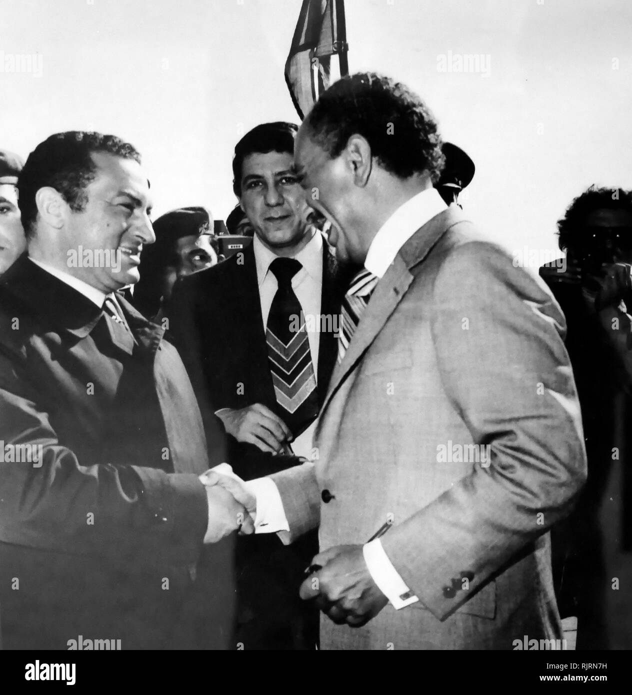 Vice President of Egypt, Hosni Mubarak with Anwar Sadat , President of Egypt, from 1970 until his assassination by fundamentalist army officers on 6 October 1981. Sadat was a senior member of the Free Officers who overthrew King Farouk in the Egyptian Revolution of 1952, and a close confidant of President Gamal Abdel Nasser, under whom he served as Vice President twice and whom he succeeded as President in 1970. Stock Photo