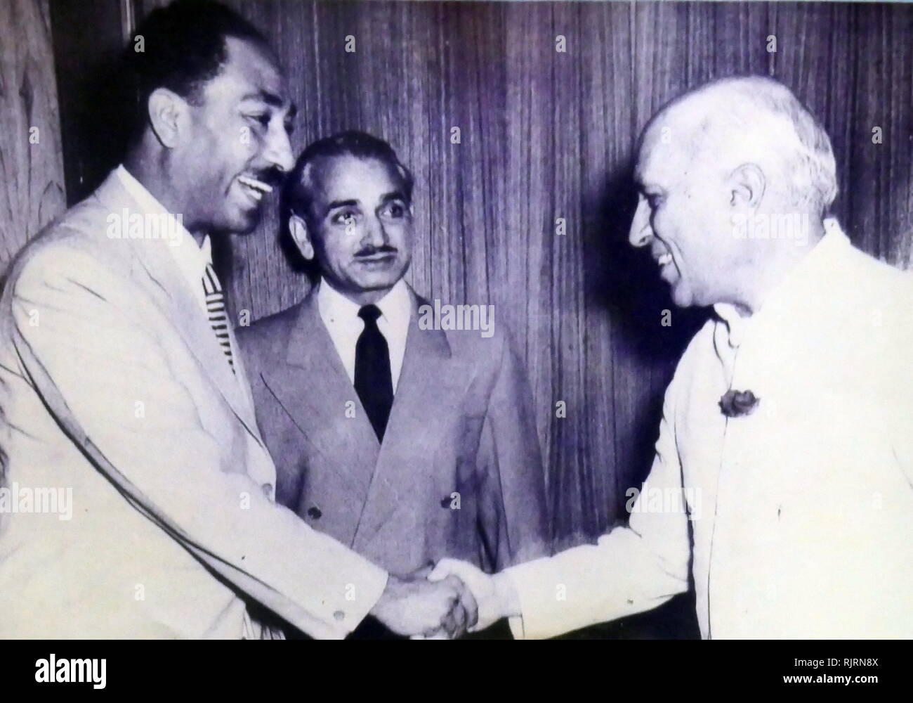 Anwar el-Sadat, of Egypt, with Prime Minister Nehru of India. 1955 Stock Photo