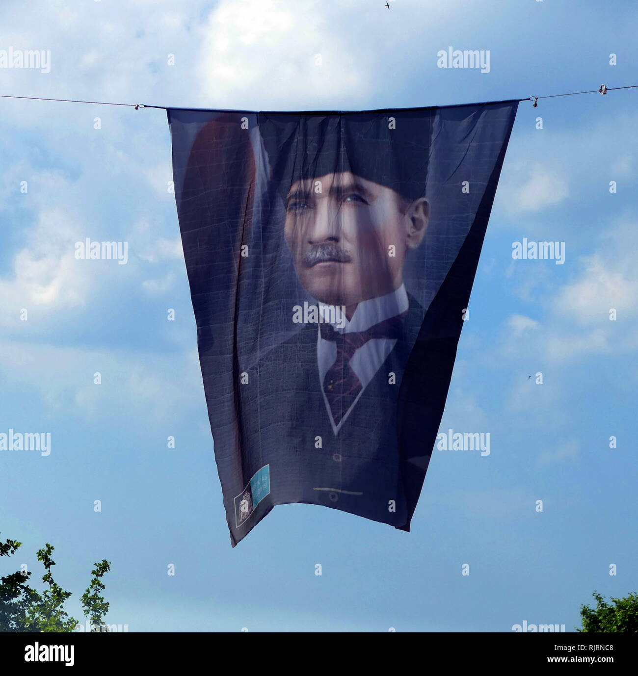Banner with portrait of Mustafa Kemal Ataturk (1881 - 1938), founder of the Republic of Turkey. President from 1923 until his death in 1938. Ideologically a secularist and nationalist, his policies and theories became known as Kemalism. Stock Photo