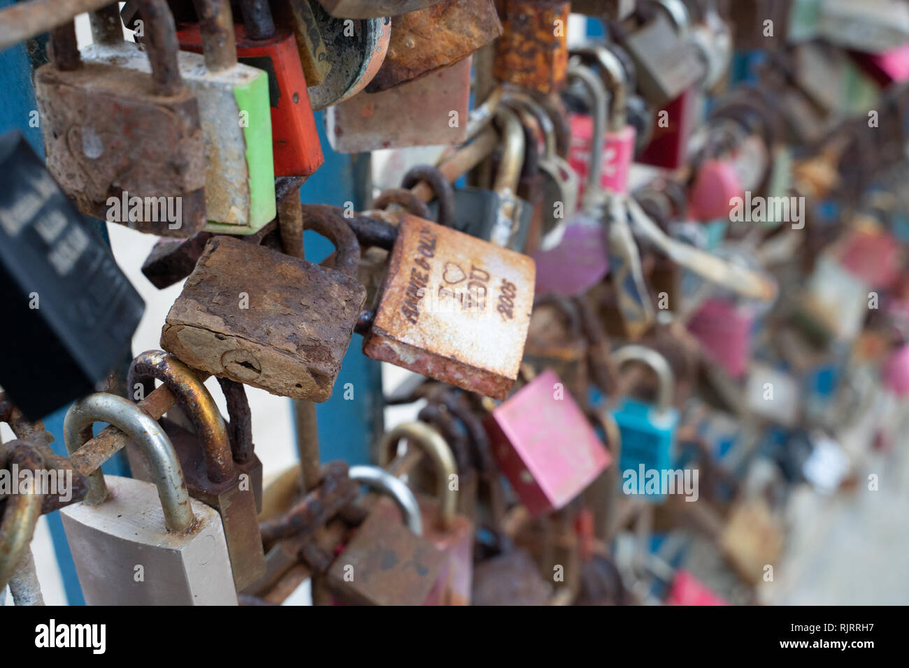 Closeup love padlocks on the wall Stock Photo