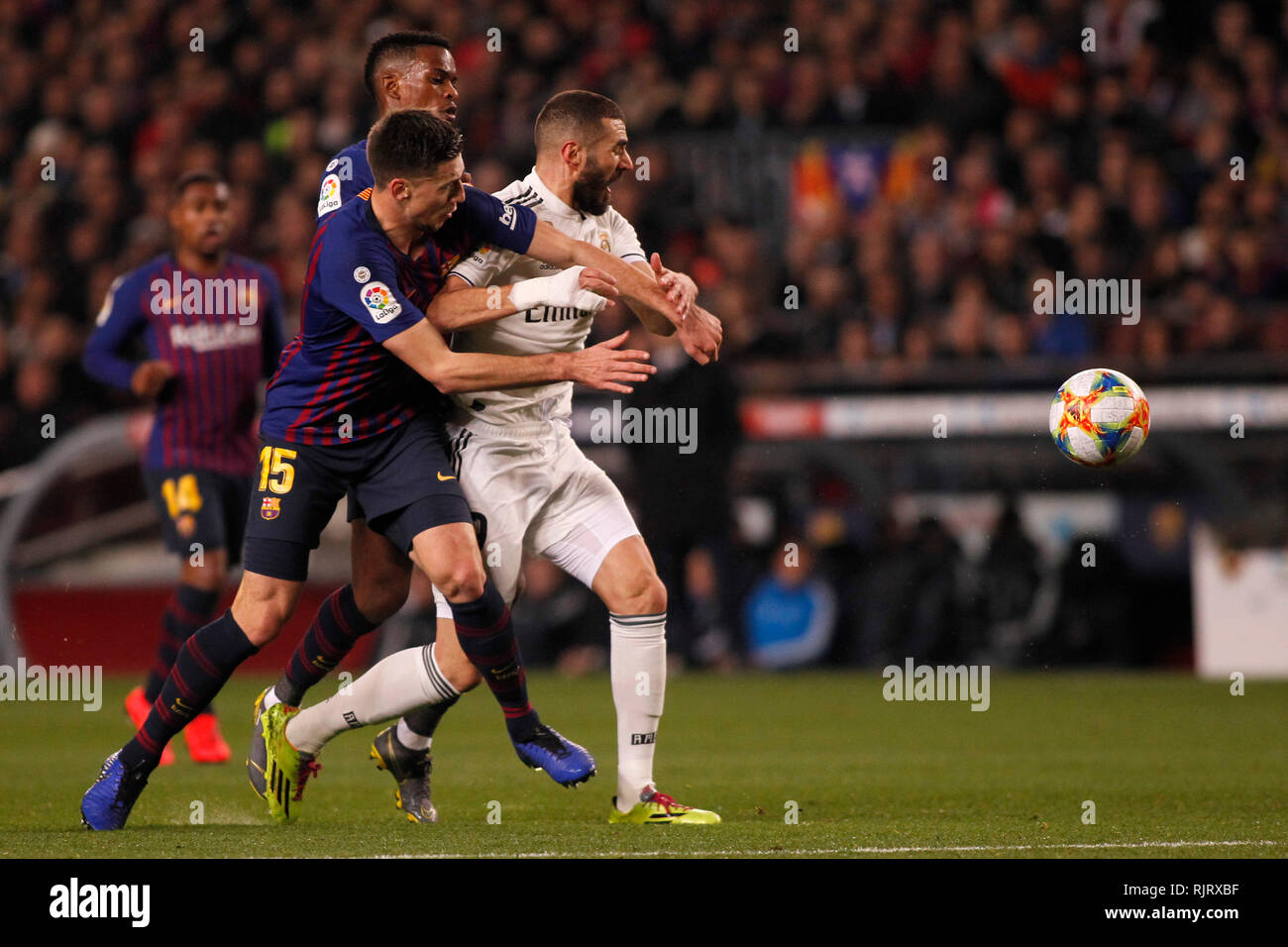 Spain La Copa, Semi finals, First Leg, FC Barcelona vs. Real Madrid, reporting live during the game -- Karim Benzema, French striker for Real Madrid fights for a ball with the opposition of Vermaelen, Belgian defender for FC Barcelona and Semedo, Portuguese defender for FC Barcelona Stock Photo
