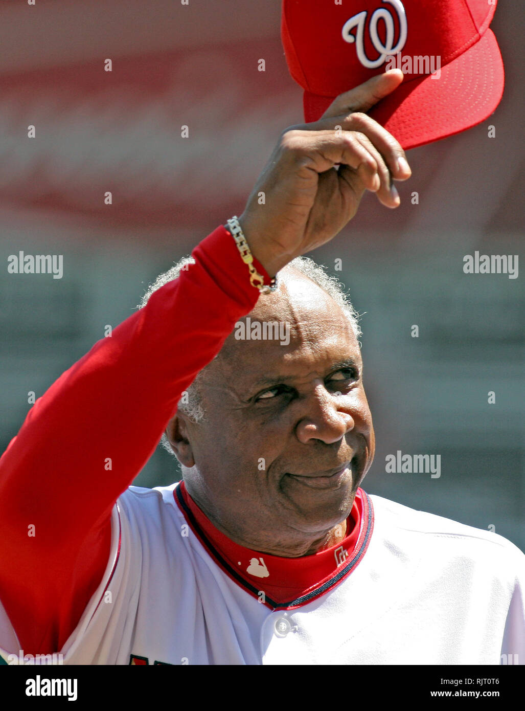 Washington, District of Columbia, USA. 11th Apr, 2006. Washington Nationals manager Frank Robinson (20) acknowledges the cheers of the crowd as his team opens the 2006 home baseball season at RFK Stadium in Washington, DC on April 11, 2006. The Nationals' opponents are the New York Mets. Credit: Arnie Sachs/CNP/ZUMA Wire/Alamy Live News Stock Photo